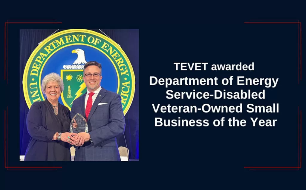 Evie and Tracy accept the SDVOSB Small Business of the Year Award